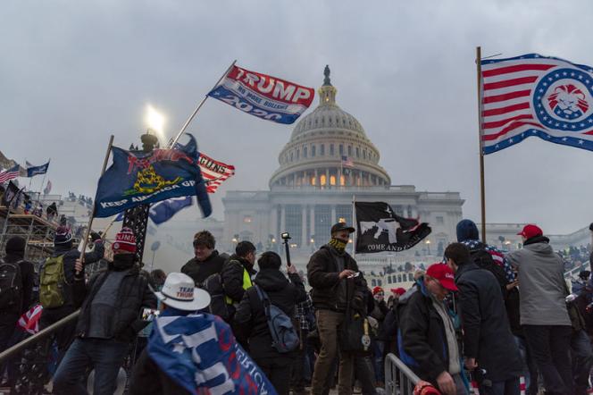 Flags flying in front of the Capitol during the insurrection