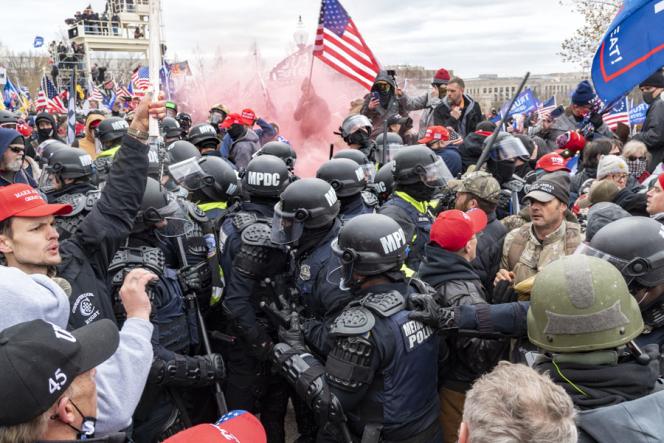 Police and rioters in a skirmish.